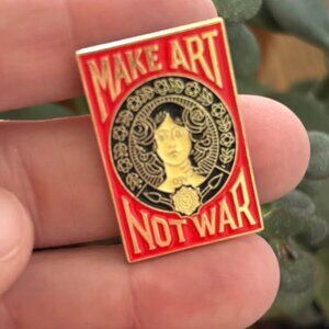 Brand new beautiful “Make Art Not War” enamel pin brooch